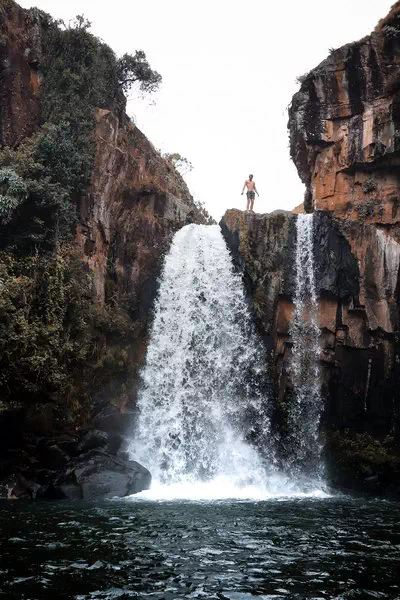 Man at the waterfall